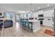 Bright kitchen featuring an island with bar seating, modern appliances, and a view to the dining area at 546 Calhoun Falls Dr., Myrtle Beach, SC 29577