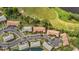 An aerial view showcases the community, golf course, and waterway at 5801 Oyster Catcher Dr. # 1623, North Myrtle Beach, SC 29582