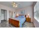 Comfortable bedroom with wood floors, a queen bed, and an ensuite bathroom at 5801 Oyster Catcher Dr. # 1623, North Myrtle Beach, SC 29582