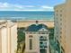 Beachfront condo building featuring a rooftop deck with ocean views and private balconies at 5801 Oyster Catcher Dr. # 1623, North Myrtle Beach, SC 29582
