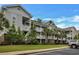 Multi-story condominium building with well-maintained landscaping and ample parking at 5801 Oyster Catcher Dr. # 1623, North Myrtle Beach, SC 29582