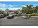 Exterior view of building with parking in front of the building with balconies at 5801 Oyster Catcher Dr. # 1623, North Myrtle Beach, SC 29582