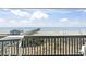 Balcony view of the ocean, beach, and fishing pier at 6000 North Ocean Blvd. # 204, North Myrtle Beach, SC 29582