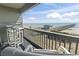 Inviting balcony with seating overlooks ocean views, offering a relaxing space with a coastal ambiance at 6000 North Ocean Blvd. # 204, North Myrtle Beach, SC 29582