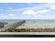 Enjoy this gorgeous view of the ocean and pier from the balcony at 6000 North Ocean Blvd. # 204, North Myrtle Beach, SC 29582
