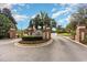 Welcome to Seaside Plantation, a gated community featuring brick pillars, lush landscaping, and stately signage at 601 Tradewind Ct., North Myrtle Beach, SC 29582