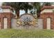 Seaside Plantation entrance sign framed by palm trees showcases the community's coastal charm at 601 Tradewind Ct., North Myrtle Beach, SC 29582