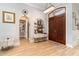 Grand entryway with wood floors, arched doorway and modern accents at 601 Tradewind Ct., North Myrtle Beach, SC 29582