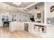 Bright kitchen features stainless appliances, modern lighting, and a view to the living room at 601 Tradewind Ct., North Myrtle Beach, SC 29582