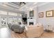Comfortable living room featuring a fireplace, tray ceiling and views of the water at 601 Tradewind Ct., North Myrtle Beach, SC 29582