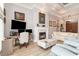 Living room with fireplace, accent lighting, and an adjacent workstation at 601 Tradewind Ct., North Myrtle Beach, SC 29582
