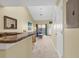 Open-concept living area with vaulted ceilings and access to outdoor patio at 617 14Th Ave. S # 83, Surfside Beach, SC 29575