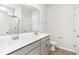 Bright bathroom featuring a double sink vanity with gray cabinets, a toilet, and a shower tub combo at 713 Lambeth Ln., Conway, SC 29526