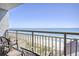 Balcony with oceanfront views and comfortable seating overlooking the pristine beach at 7200 Ocean Blvd. N # 1059, Myrtle Beach, SC 29572
