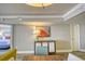 Cozy living area featuring a decorative cabinet, table, and comfortable seating for relaxation at 7200 Ocean Blvd. N # 1059, Myrtle Beach, SC 29572