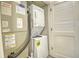 Utility closet with washer and dryer ensuring laundry convenience at 7200 Ocean Blvd. N # 1059, Myrtle Beach, SC 29572