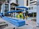 Fun waterslide and kiddie pool area with colorful features for children to enjoy at 7200 Ocean Blvd. N # 1059, Myrtle Beach, SC 29572
