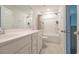 Clean white bathroom featuring a tub with shower, white cabinets, and neutral tile floors at 852 Harrison Mill St., Myrtle Beach, SC 29579