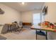 Neutral office with carpet floors, a window, desk, and TV at 852 Harrison Mill St., Myrtle Beach, SC 29579