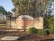 Community entrance sign for Forestbrook Estates, framed with brick and landscaping at 852 Harrison Mill St., Myrtle Beach, SC 29579