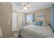 Comfortable bedroom with a ceiling fan, light walls, and tasteful decor to match any style at 900 N Waccamaw Dr. # 301, Garden City Beach, SC 29576