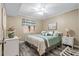 Bright bedroom with stylish decor and a comfortable bed perfect for relaxation at 900 N Waccamaw Dr. # 301, Garden City Beach, SC 29576
