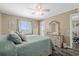 Serene main bedroom with comfortable bedding and a view of the ocean, creating a restful retreat at 900 N Waccamaw Dr. # 301, Garden City Beach, SC 29576