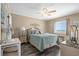Cozy main bedroom with plush bedding and ocean views, perfect for relaxation at 900 N Waccamaw Dr. # 301, Garden City Beach, SC 29576