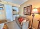 Cozy kitchenette featuring a mini fridge, microwave, and seating area at 9820 Queensway Blvd. # 1206, Myrtle Beach, SC 29572