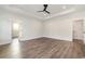 Spacious main bedroom with wood floors, trey ceilings, and a ceiling fan at 1052 Merritt Rd, Conway, SC 29526