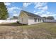 View of the home's exterior and surrounding yard space at 115 Blue Pride Dr., Loris, SC 29569