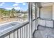 Cozy balcony overlooking the community pool and landscaped grounds, providing a relaxing outdoor space at 1230 St. George Ln. # F, Myrtle Beach, SC 29588