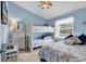 Coastal-themed bedroom with bunk beds, a queen bed, dresser, and a TV for relaxation at 1230 St. George Ln. # F, Myrtle Beach, SC 29588