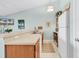Kitchen offering laminate countertops, an open layout, and stainless appliances at 1230 St. George Ln. # F, Myrtle Beach, SC 29588