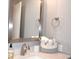 Bright bathroom featuring a vanity with a modern faucet, framed mirror, and decor at 140 Spanish Oak Ct. # 1, Surfside Beach, SC 29575