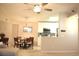 Charming dining area featuring a round glass table, wooden chairs, and a modern light fixture at 140 Spanish Oak Ct. # 1, Surfside Beach, SC 29575