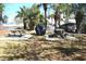 Outdoor grilling area with picnic tables and a covered grill, perfect for community gatherings at 140 Spanish Oak Ct. # 1, Surfside Beach, SC 29575