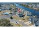 Aerial view of complex overlooking river, with a pool, and parking at 212 Landing Rd. # G, North Myrtle Beach, SC 29582