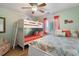 Charming bedroom with a bunk bed, full bed, beach-themed decor, and plenty of natural light at 212 Landing Rd. # G, North Myrtle Beach, SC 29582