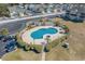 Aerial view of community pool, with spa, and fenced in area at 212 Landing Rd. # G, North Myrtle Beach, SC 29582