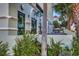 Exterior view of a building with a Starbucks and outdoor seating area surrounded by tropical plants at 3000 Ocean Blvd. # 1209, Myrtle Beach, SC 29577