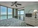 Main bedroom with ocean view, balcony access, and large dresser at 3000 Ocean Blvd. # 1209, Myrtle Beach, SC 29577