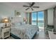 Bright main bedroom boasts ocean views and a king-size bed at 3000 Ocean Blvd. # 1209, Myrtle Beach, SC 29577