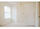 Bedroom featuring neutral carpet, a window with sheer curtain, and a closet at 3285 Della Rd., Longs, SC 29568