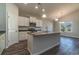 Modern kitchen featuring an island with a sink and seating, stainless steel appliances, and natural light at 415 Lifestyle Court, Surfside Beach, SC 29575