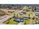 Aerial view of a peaceful neighborhood showcasing well-maintained homes and green spaces at 4938 Trooper Ln., Loris, SC 29569