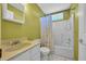 Cozy bathroom featuring a shower and bathtub with a shower curtain and neutral sink at 4938 Trooper Ln., Loris, SC 29569