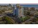 A high, aerial shot of the condo building with city and ocean views at 601 Mitchell Dr. # 203, Myrtle Beach, SC 29577