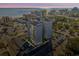 Aerial view of the building with the city and ocean in the background at 601 Mitchell Dr. # 203, Myrtle Beach, SC 29577