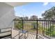 Scenic balcony view overlooking lush greenery and nearby buildings at 601 Mitchell Dr. # 203, Myrtle Beach, SC 29577